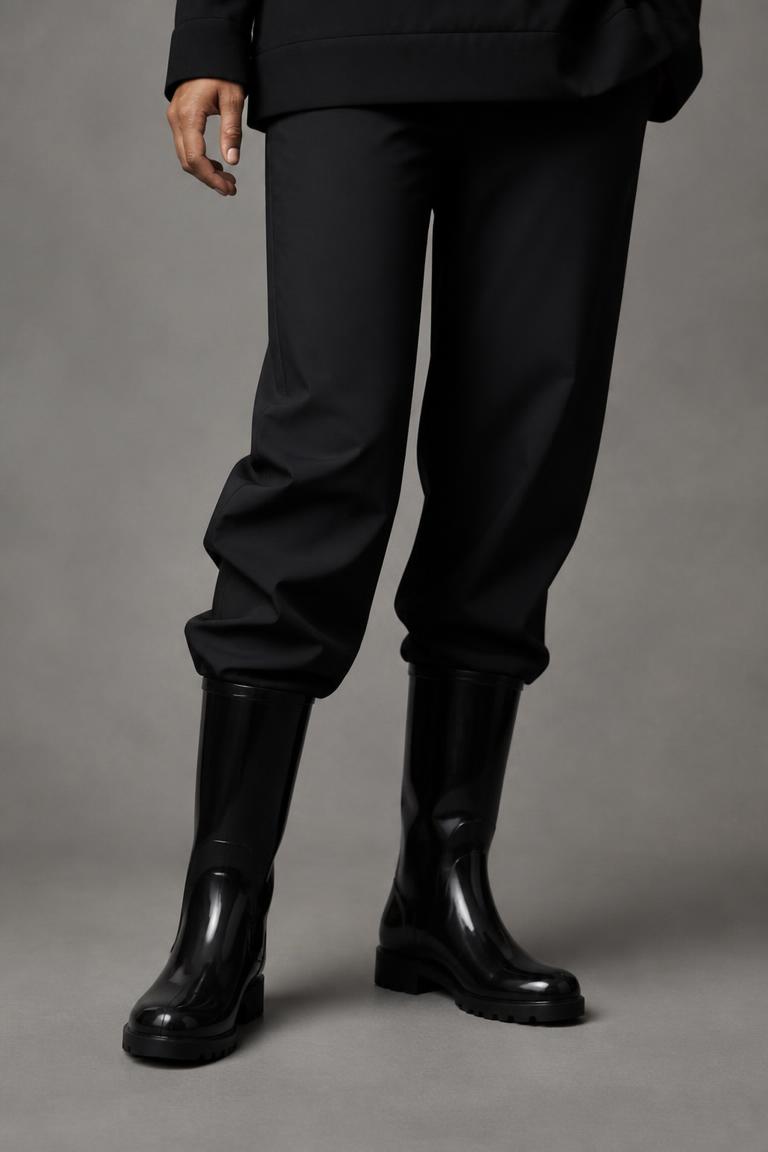 Black waterproof rain boots shown on Maya